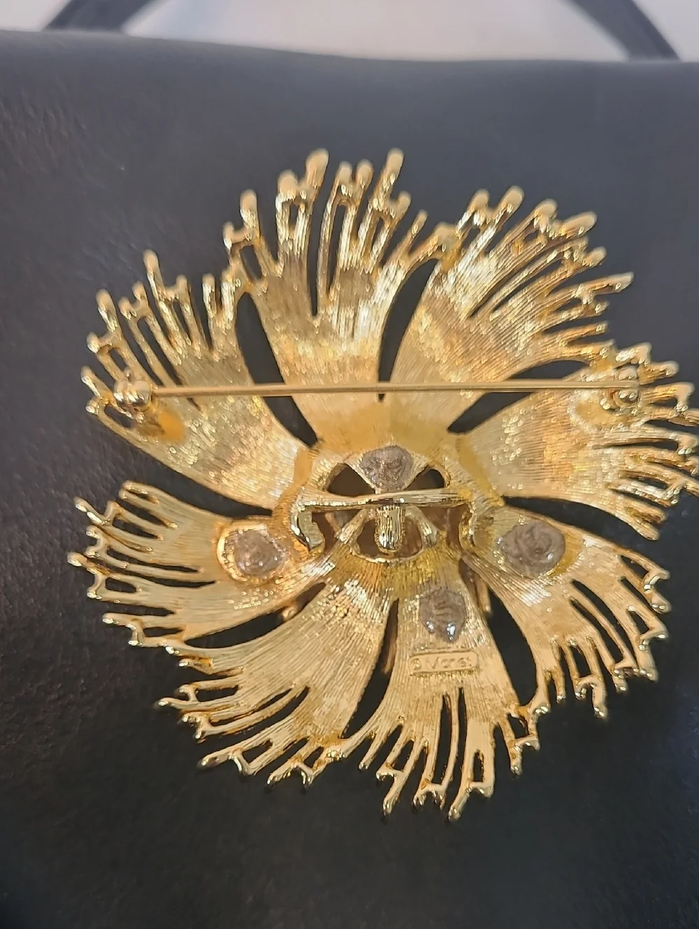 Monet Vintage Cordelia Gold Tone Starburst Brooch with Textured Metal Threads